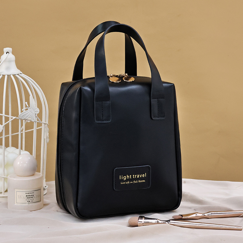 Handheld makeup bag