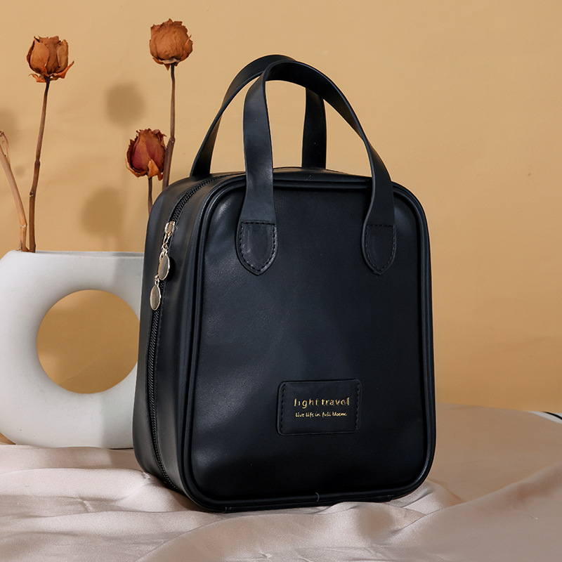 Handheld makeup bag