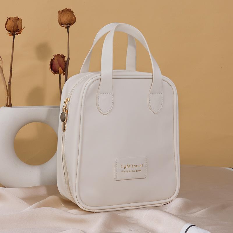 Handheld makeup bag