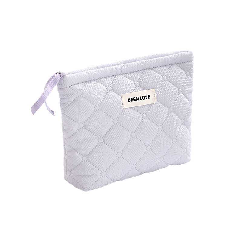 Holding a storage bag in hand