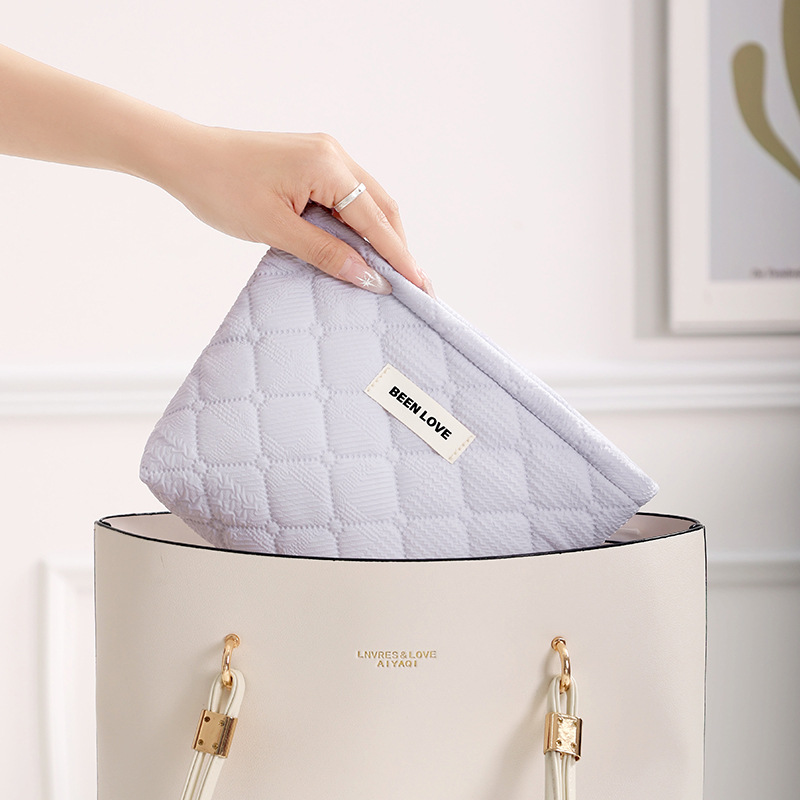 Holding a storage bag in hand